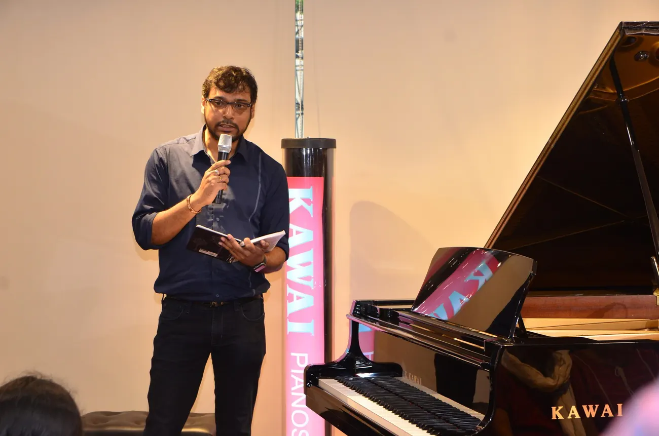 Kaushik Das introducing a student recital