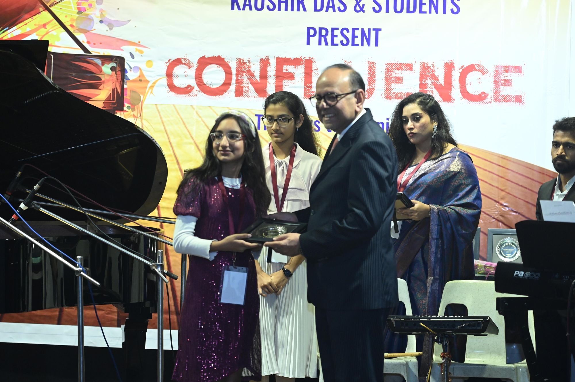 Students receiving their exam awards at Confluence 2025